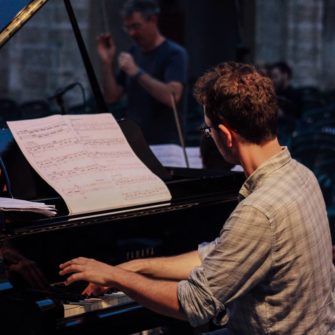 Daniel Pesca playing the piano in concert