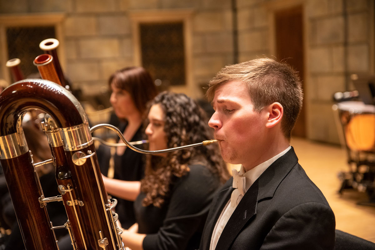 Double bassoon student in Philharmonia rehearsal.