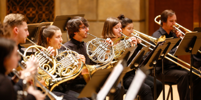 Brass Guild in Eastman Theatre, showing from left to right: trumpets, French horns, and trombones. Photo by Matt Wittmeyer.