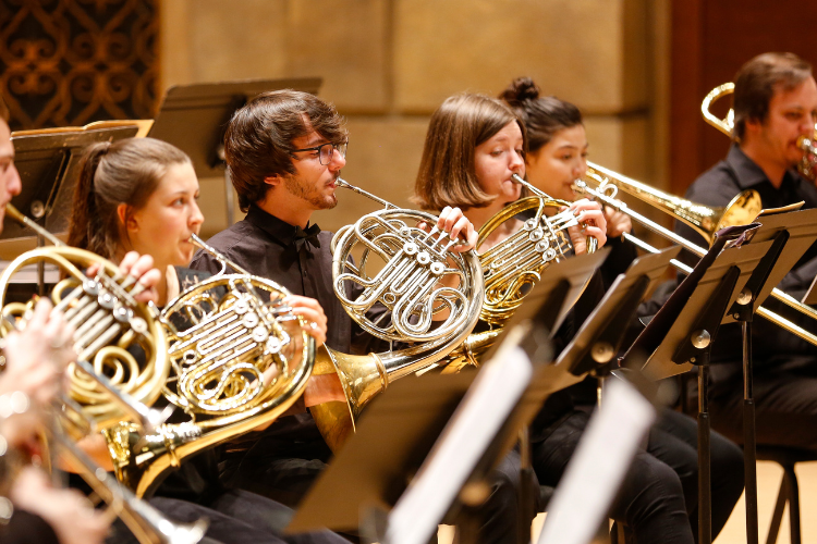 Brass Guild in Eastman Theatre, showing from left to right: trumpets, French horns, and trombones. Photo by Matt Wittmeyer.