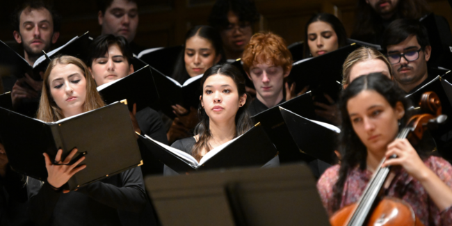 Chorus and Cellist in performance
