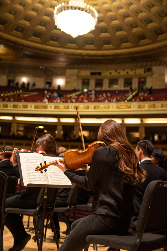 Violin student on Kodak Hall stage.